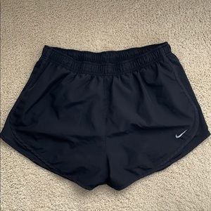 All-black Nike running shorts